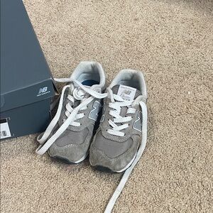 New Balance Kids Sneakers in Gray and White